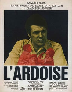 Affiche du film "L'Ardoise" (1970) montrant Salvator Adamo avec un fond sombre et des lettres blanches en gras.